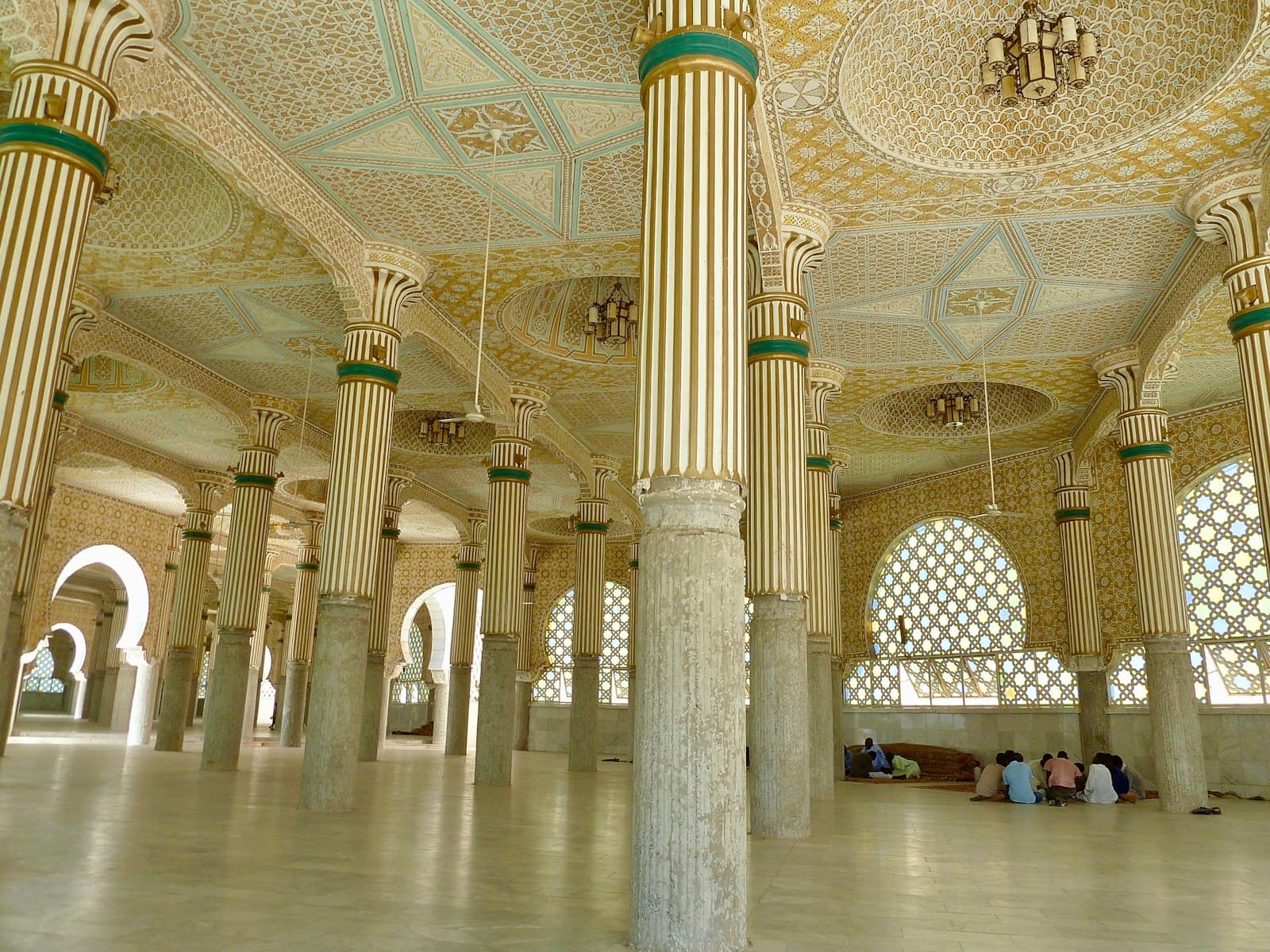 Students and worshippers gathered inside a grand mosque hall
